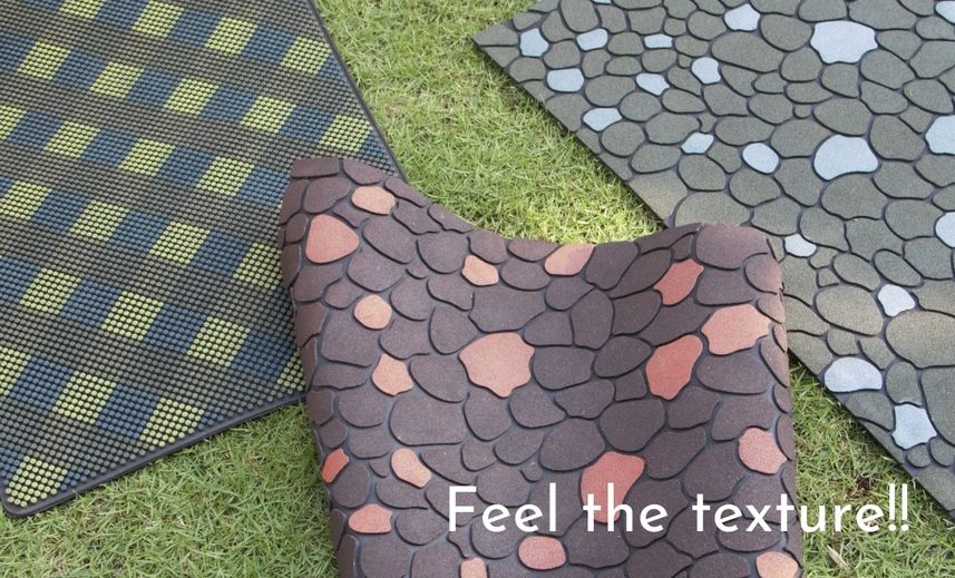 Sand blasted rubber mats stone design brown and terracotta.